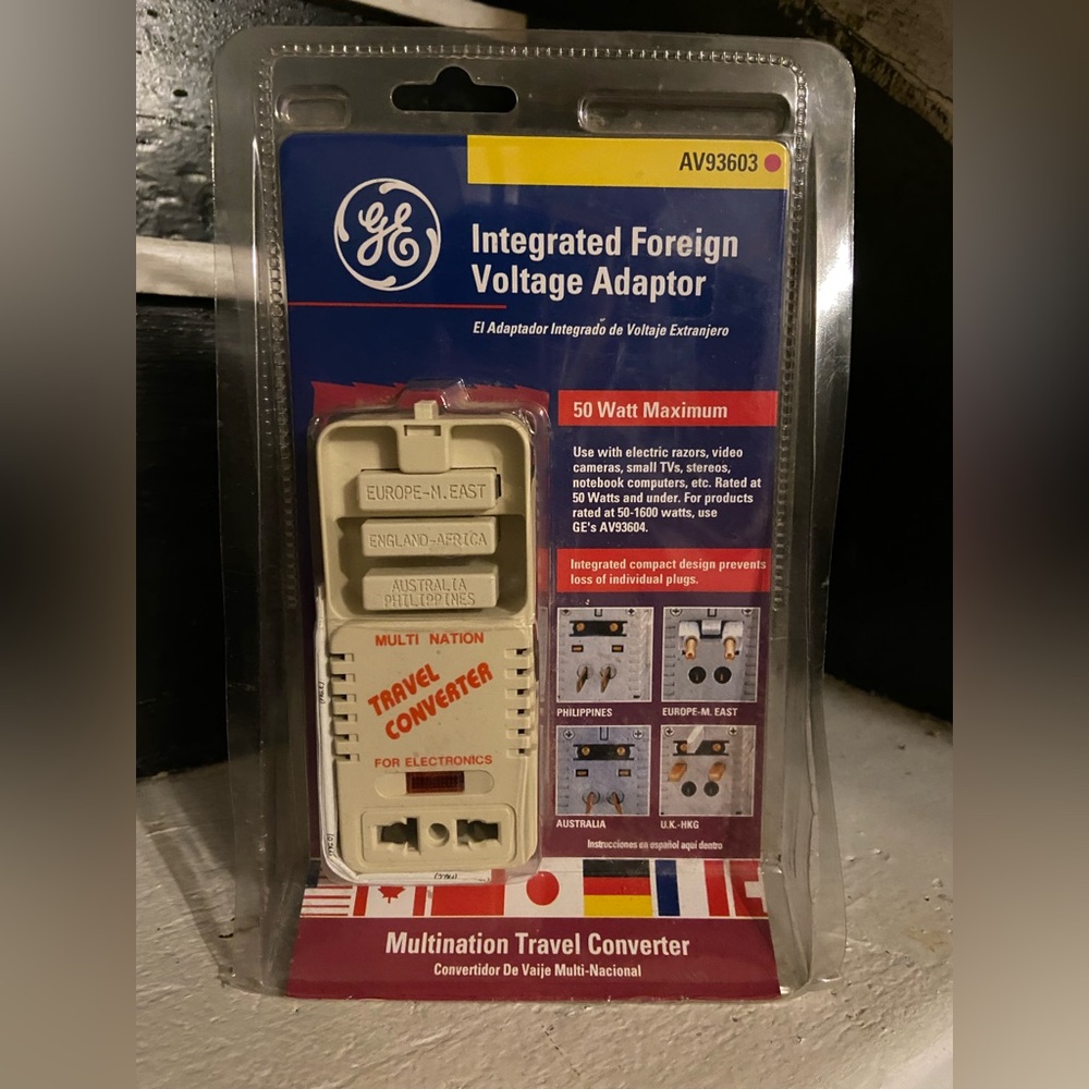 Multi nation travel adapter converter. Never opened.